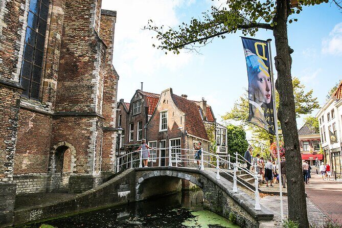 Kinderdijk Windmills and Delft Small-Group Tour from Amsterdam - Delft’s Canals and Vermeer Corners at a Slower Pace
