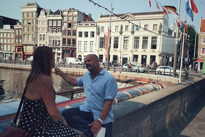 LGBTQI+ History Tour of Amsterdam - Dam Square: the center of power, crowds, and LGBTQ life