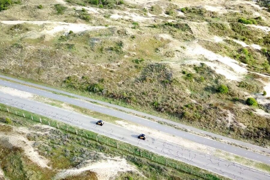 Lisse: Drive-it-Yourself Electric Dune & Beach Audio Tour - Onboard audio guides: English and German facts you can use