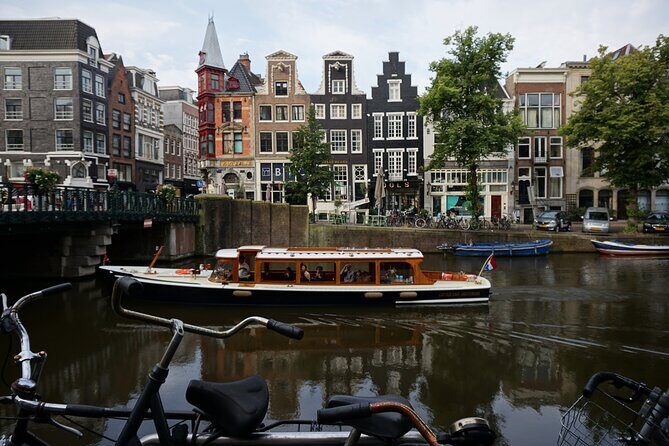 Morning Canal Cruise Amsterdam in Small-Group - Captain Dave and the 1928 Royal-Style Saloon Boat