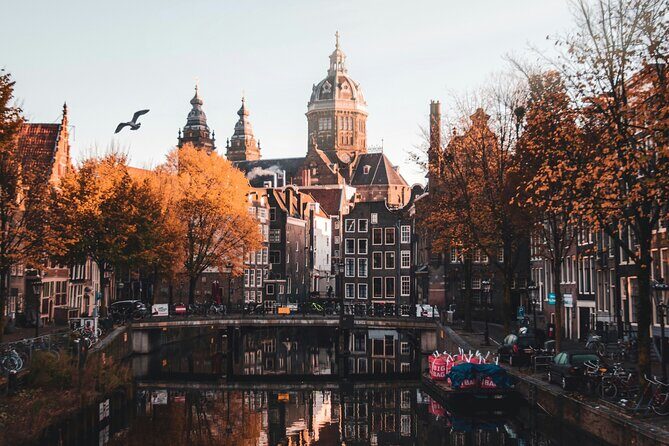 Personalized Hidden Gems of Amsterdam Private Tour with a Local - St. Nicholas Basilica optional visit, plus a wooden house and the Beguines