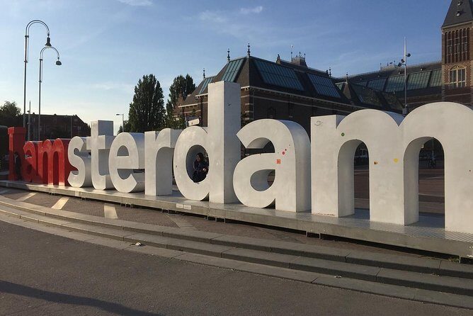 Private Amsterdam Departure Transfer to AMS Schiphol Airport - Meeting your driver in Amsterdam: pickup, luggage help, and real communication