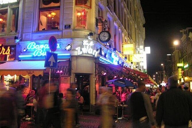 Private Amsterdam Red Light District and Coffee Shop Tour - Starting at Damrak: An easy meeting point that gets you walking fast