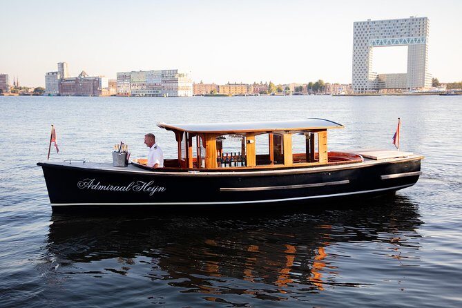 Private boat tour on a electric saloon boat - From the Museum of the Canals to Prinsengracht and Westerkerk