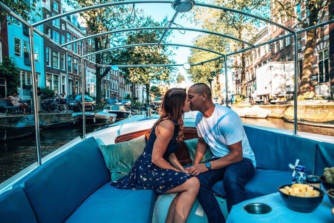 Private Romantic Canal Cruise Amsterdam with Bubbly and Snacks - A private boat that turns Amsterdam into date-night mode