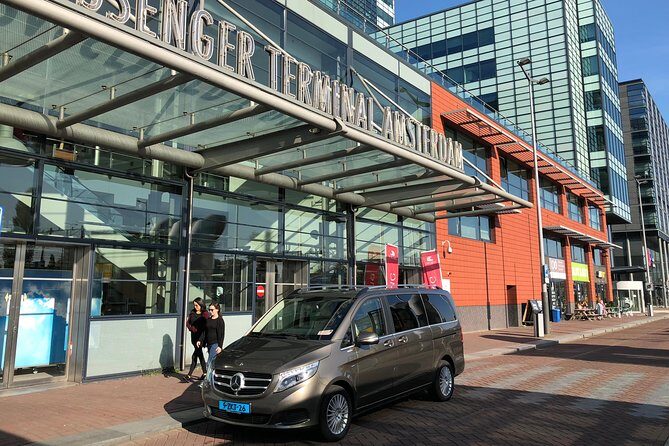 Private Roundtrip Transfer Schiphol Airport to Amsterdam - On the road in a climate-controlled car and what you might see