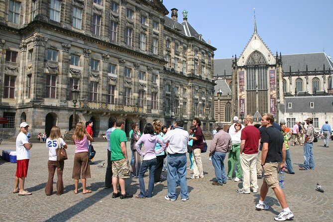 Private Tour: Amsterdam City Walking Tour and Canal Cruise - Dam Square to the Jordaan: Monuments, Royals, and War Remembrance