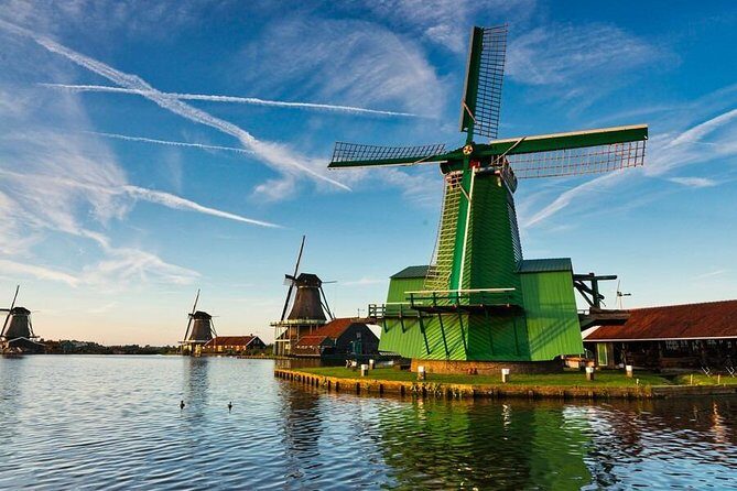 Private Zaanse Schans & Volendam Tour: Windmills, Cheese & Clogs - Zaanse Schans windmills in action: paint mill, sawmill, spice mill, and peanut oil
