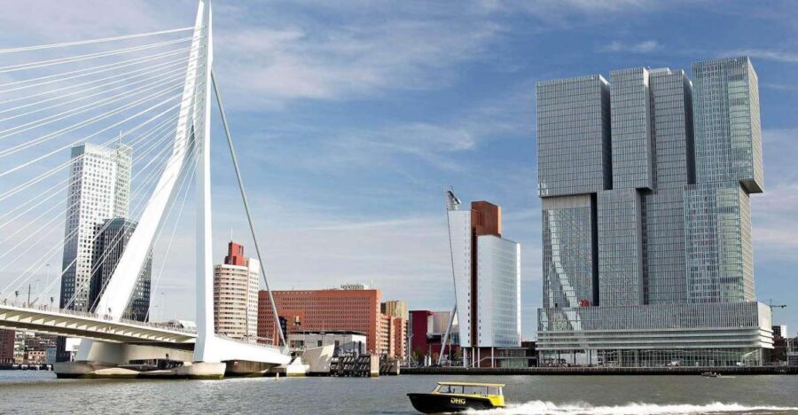 Rotterdam: De Rotterdam, Cube Houses, Watertaxi and Markthal - Riding the water taxi under Erasmus Bridge