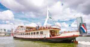 Rotterdam: Harbor Cruise on a Historic Ship - Setting Off: Erasmus Bridge to Veerhaven