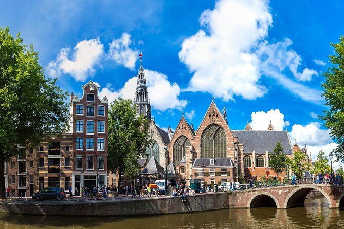 Secrets of Amsterdam Walking Tour plus Dutch Sweets Tasting - Bloemenmarkt: the floating flower market moment