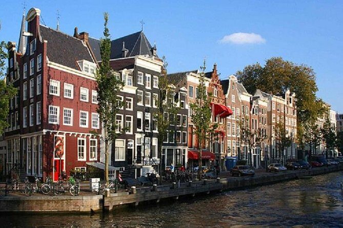 Secrets of Amsterdam Walking Tour plus Dutch Sweets Tasting - Munttoren (Munt Tower): the story stop you’ll remember later