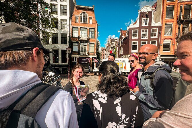 Small Group Walking Tour - Hello Amsterdam - Torensluis: UNESCO canal belt views with the harder history included