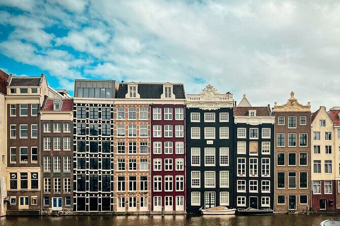 Small Group Walking Tour - Hello Amsterdam - Westerkerk finish near the Homomonument: diversity, acceptance, and a meaningful wrap-up