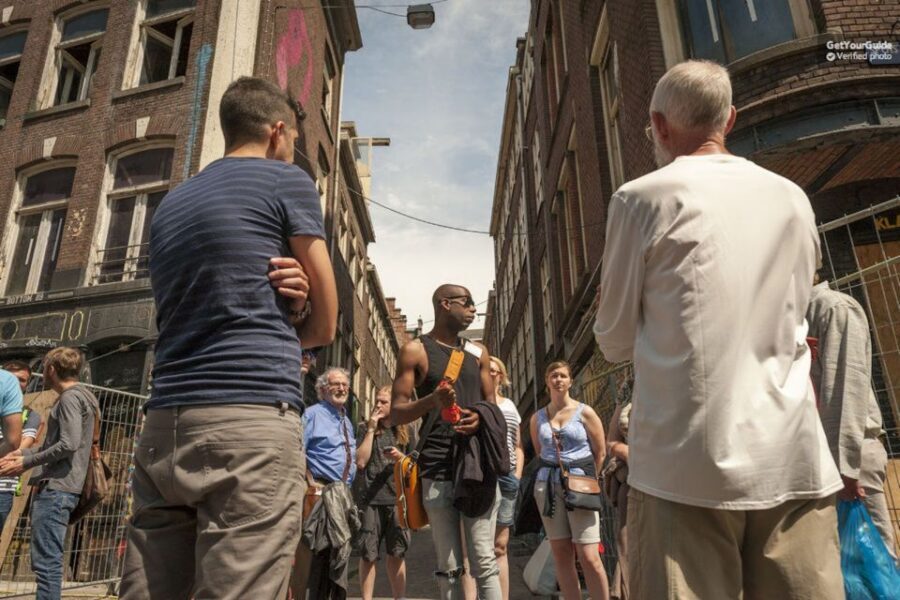 Sprechen Sie Gras? German Tour of Amsterdam's Coffeeshops - Dam Square Photo Stop and the Walk Toward Royal History