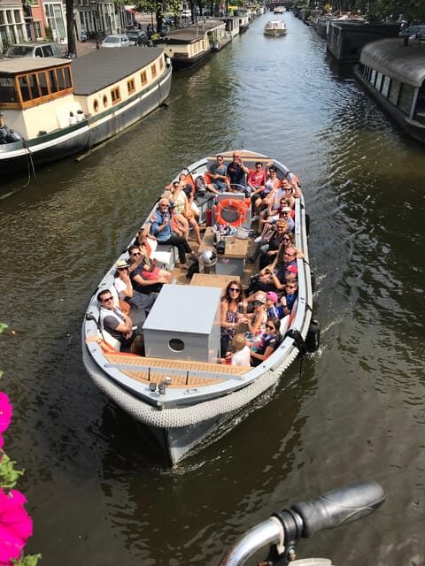 Visit Amsterdam by Boat with a French Guide (french) - Why this 1.5-hour French canal cruise feels more useful than a quick loop