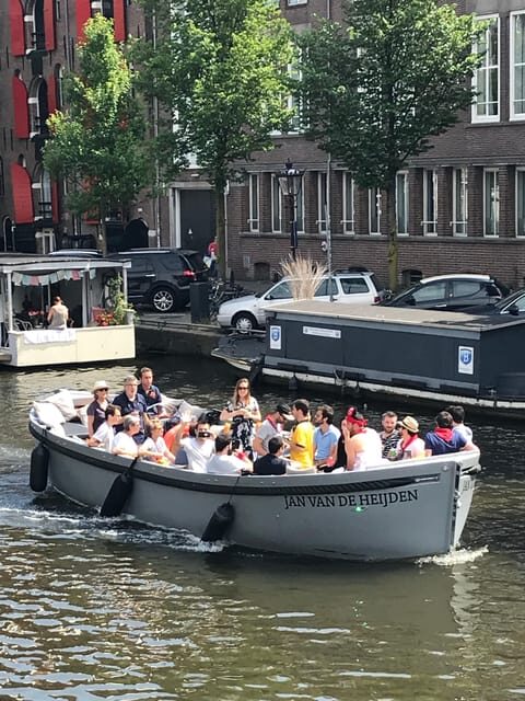 Visit Amsterdam by Boat with a French Guide (french) - The small electric boat advantage (and why it matters in Amsterdam)
