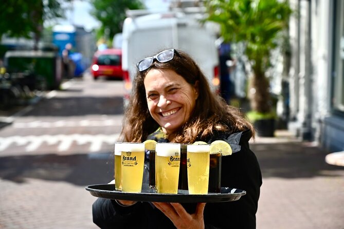 Amsterdam Food Tour of 10+ Local Classic Tastings in Jordaan Area - Fishmonger moment: herring and kibbeling the Dutch way