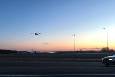 Private departure transfer from Amsterdam to Schiphol Airport (AMS) - Door-to-Door Pickup: From Hotel Steps to Cruise Ship Arrival